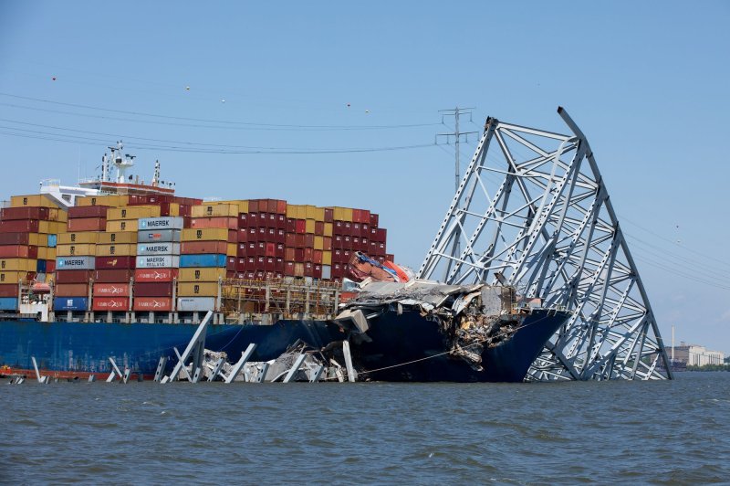 Salvors with the Unified Command prepare the section of bridge sitting on the port side bow of the M/V Dali for controlled demolition, precision cutting, on May 13. Lawyers said a deal has been reached that would allow some of the crew to return home this week. Photo by Christopher Rosario/U.S. Army Corps of Engineers/UPI