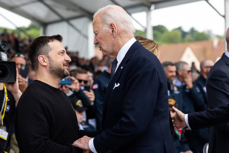 President Joe Biden met with Ukraine President Volodymyr Zelensky Friday in Paris. Biden apologized for delayed aid and vowed the U.S. is "still in, completely" to stand with Ukraine against Russian aggression. Biden announced $225 in new aid for Ukraine. Photo by Ukraine's President Office/UPI