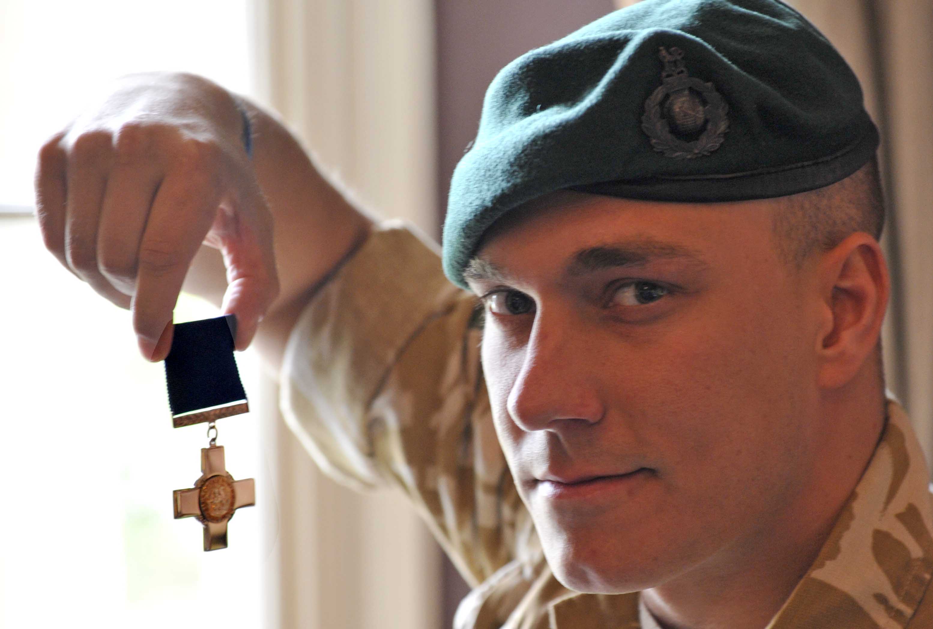 Matt Croucher with his George Cross - Britain's highest award for gallantry