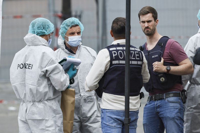 View of the crime scene after a knife attack in the city centre in Mannheim, Germany, on Friday. A police officer who was among the six injured in the attack died Sunday, authorities said. Photo by Ronald Wittek/EPA-EFE