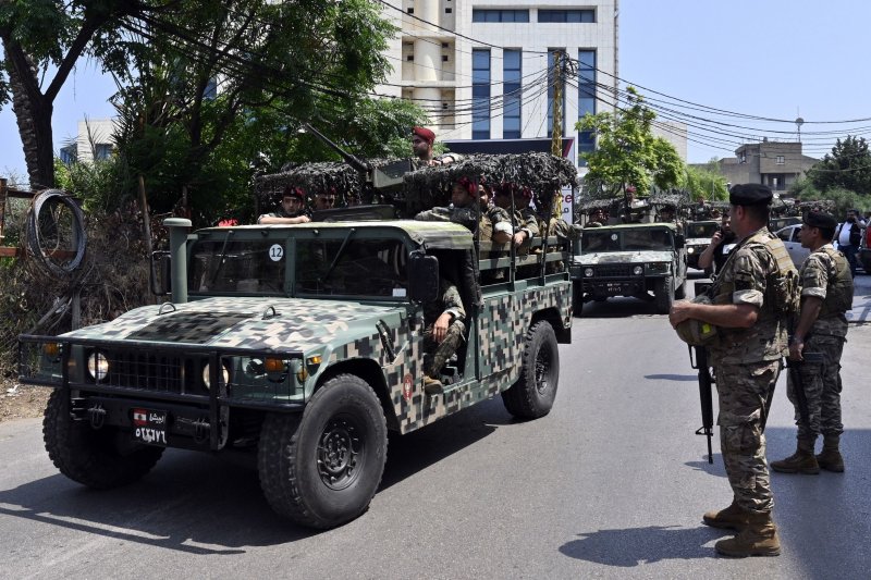 Lebanese special forces patrol a road Wednesday leading to the U.S. Embassy in the northern Beirut suburb of Awkar. Lebanon Armed Forces were out in force in the area after a fire-fight with a gunman, said to be a Syrian national, who was shooting at the embassy complex. Photo by Wael Hamzeh/EPA-EFE