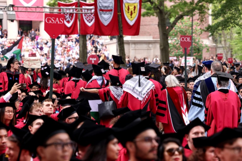 More than a thousand students, faculty members and other participants walked out of Harvard's Commencement ceremony last month. [Mark Stockwell/EPA]