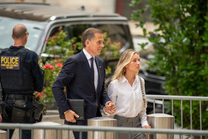 Hunter Biden (L) and wife Melissa Cohen Biden (R) arrive Tuesday for a possible verdict in his trial on federal gun charges at J. Caleb Boggs Federal Building in Wilmington, DE. Photo by David Muse/UPI