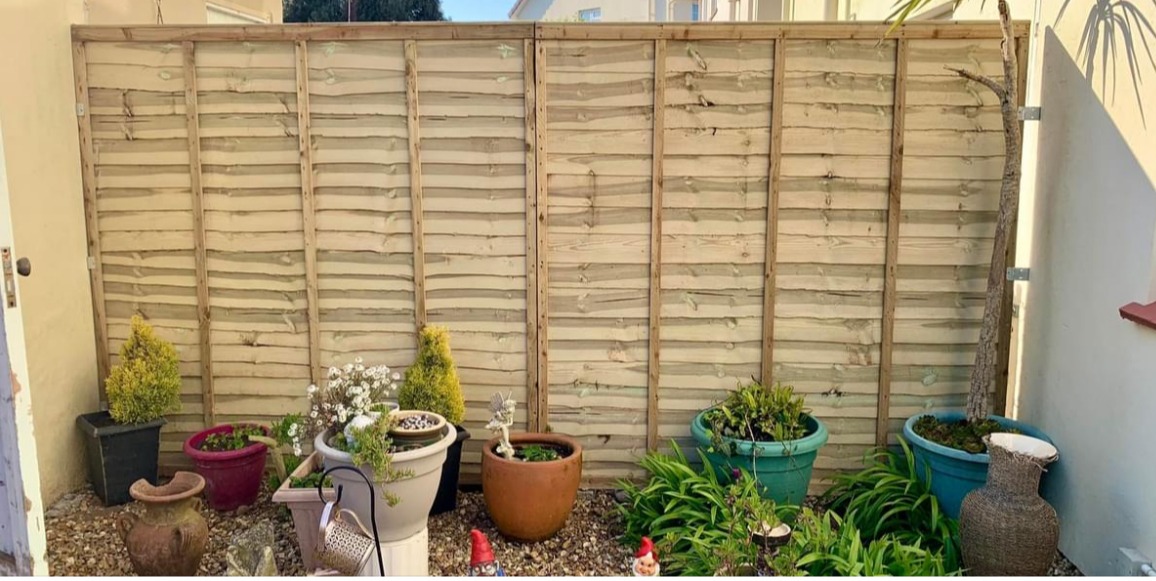 Before the transformation Libby's garden wasn't much to look at and the dull garden fence was an eyesore