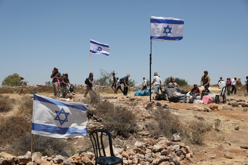 Illegal Israeli settlers occupy an illegal outpost near the Israeli settlement of Kiryat Arba near the Palestinian city of Hebron in the West Bank in 2022, before Hamas's attack on October 7, 2023. File Photo by Abir Sultan/EPA-EFE