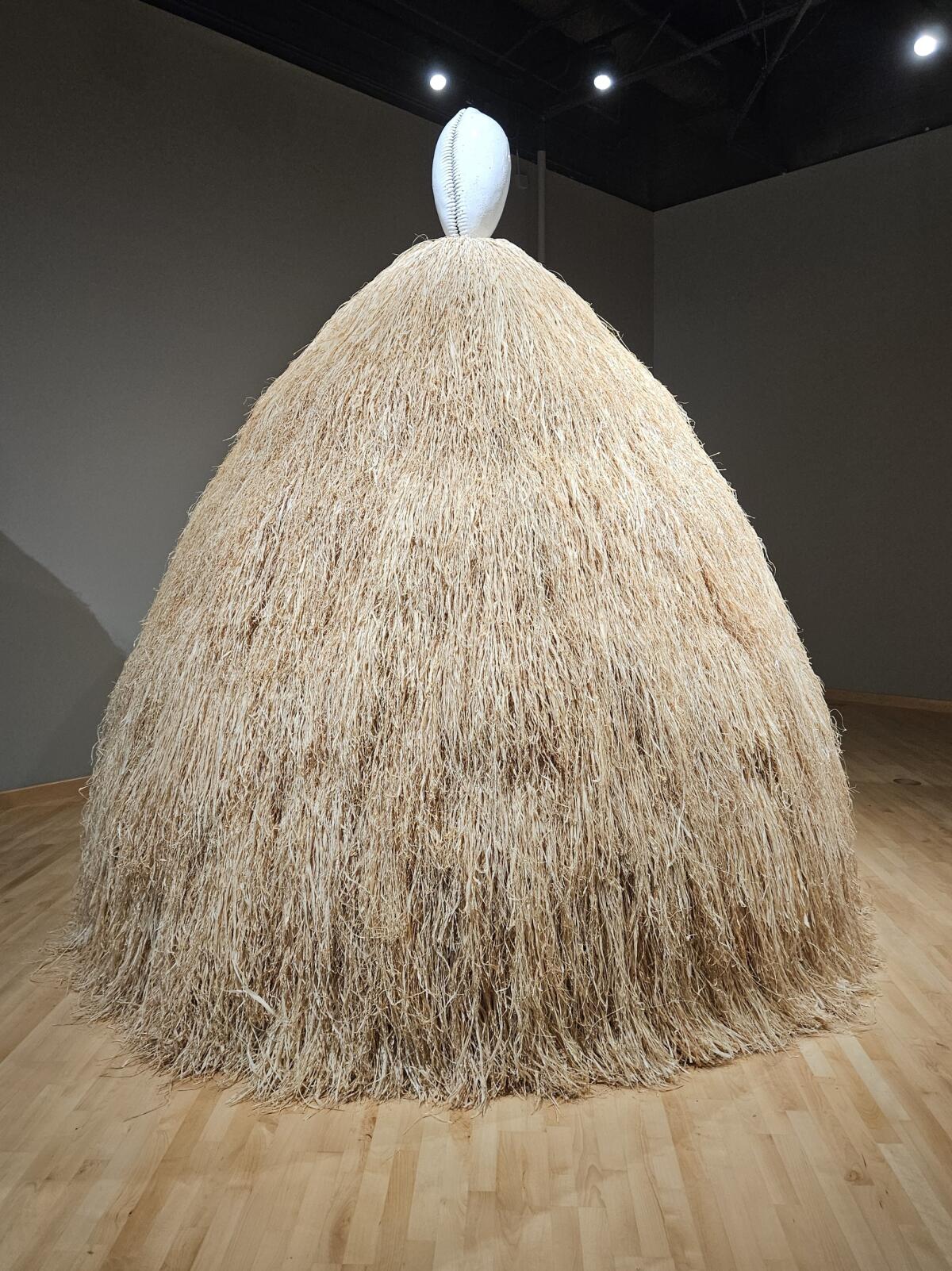 Simone Leigh, "Cupboard," 2022; stoneware, raffia and steel armature