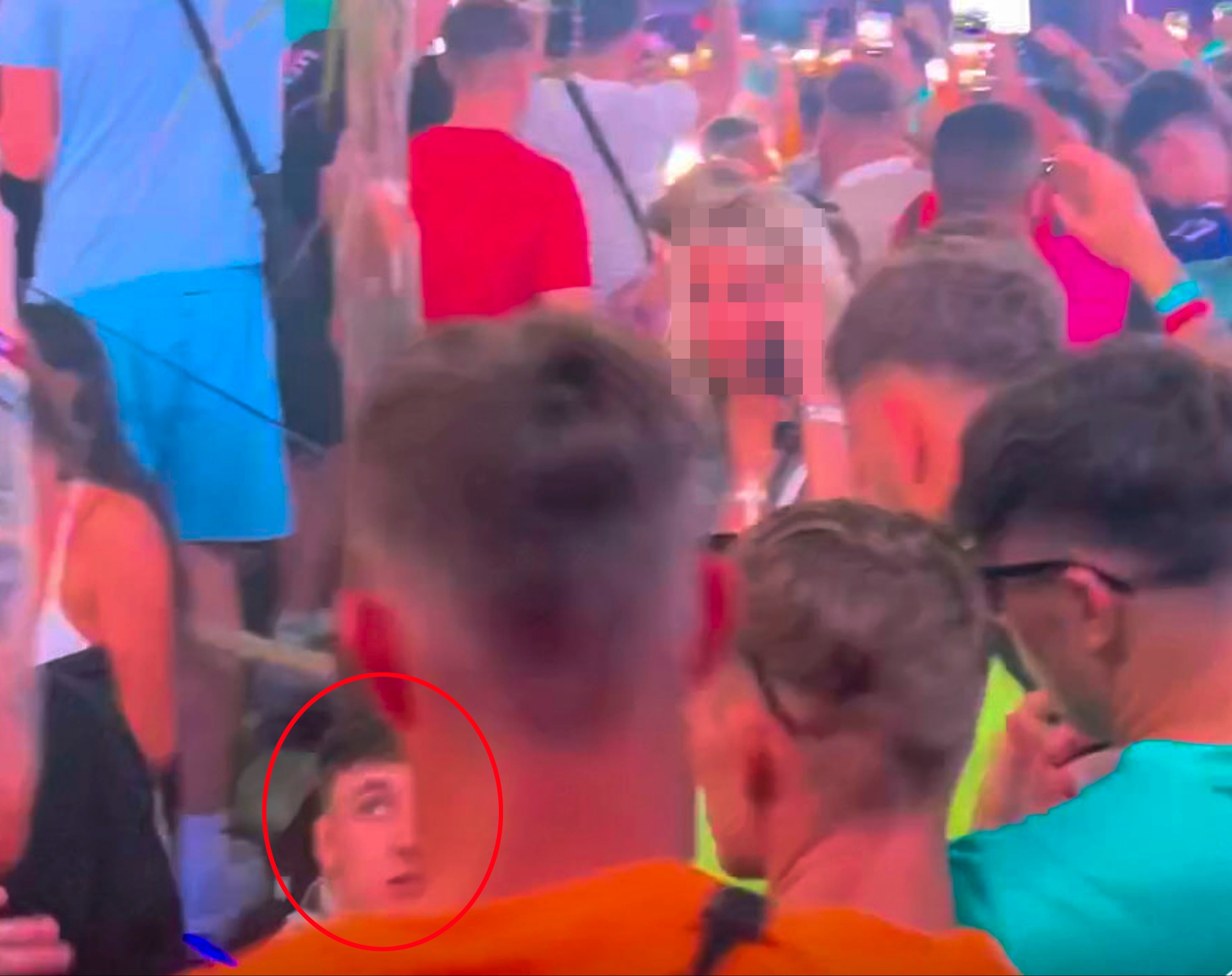 Jay, bottom centre, appeared to stumble to the floor in the packed nightclub