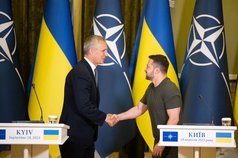 NATO Secretary General Jens Stoltenberg (L) said Friday NATO defense ministers have agreed to a new security assistance and training plan for Ukraine. Ukrainian President Volodymyr Zelensky (R) with Stoltenberg in Kyiv, Ukraine, Sept. 28, 2023. File Photo by Ukrainian President Press Office/UPI