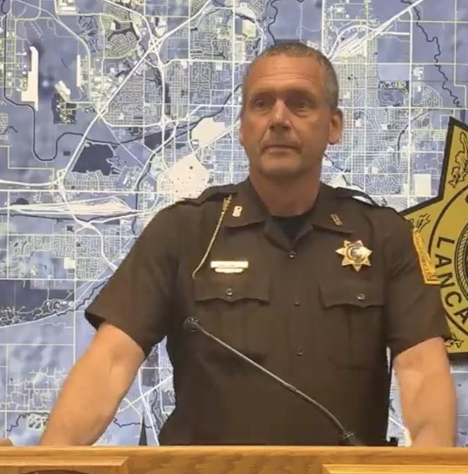 Chief Deputy Ben Houchin of the Lancaster County Sheriff's Office said Tuesday that they have yet to find a reason to impose charges after a woman who was pronounced dead was found alive after being transported to the funeral home. Screen capture courtesy of Lancaster County Sheriff's Office/Facebook