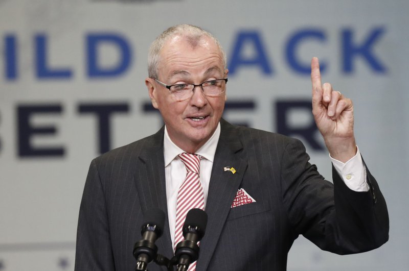 New Jersey Gov. Phil Murphy speaks before President Joe Biden delivers remarks at NJ Transit Meadowlands Maintenance Complex in Newark on October 25, 2021. Murphy complained about delays on NJ Transit on Thursday. File Photo by John Angelillo/UPI