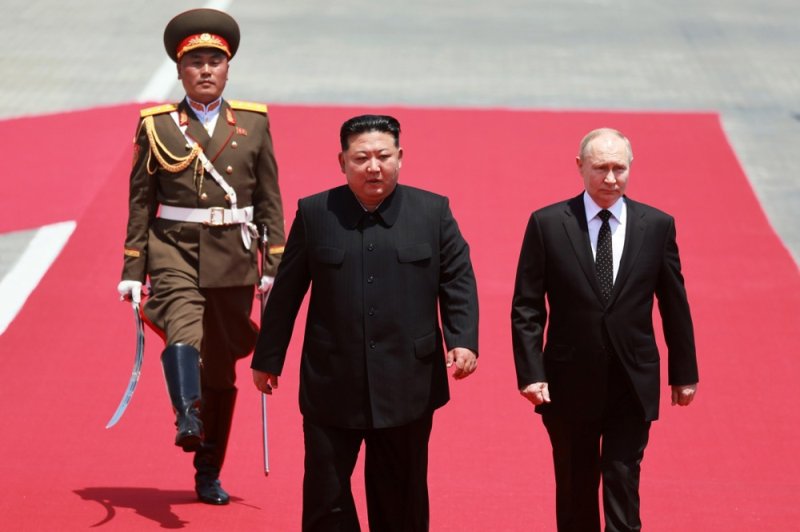 Russian President Vladimir Putin (R) and North Korean leader Kim Jong Un attend an official welcoming ceremony during their meeting in Pyongyang, North Korea on Wednesday. Kremlin Pool Photo by Gavrill Grigorov/Sputnik/EPA-EFE