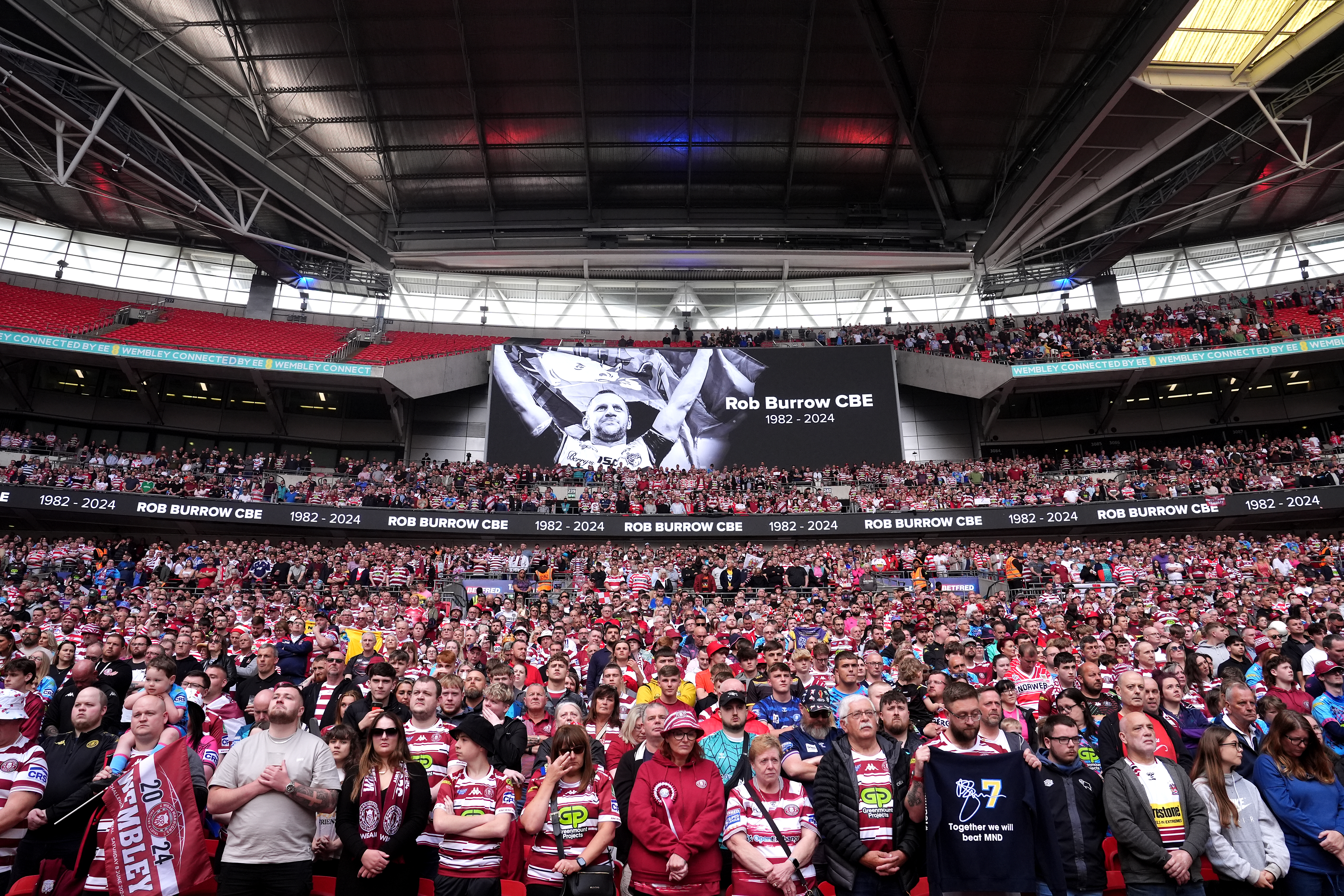 Fans during a minute silence for former Leeds Rhinos player Rob Burrow before the Challenge Cup final at Wembley Stadium