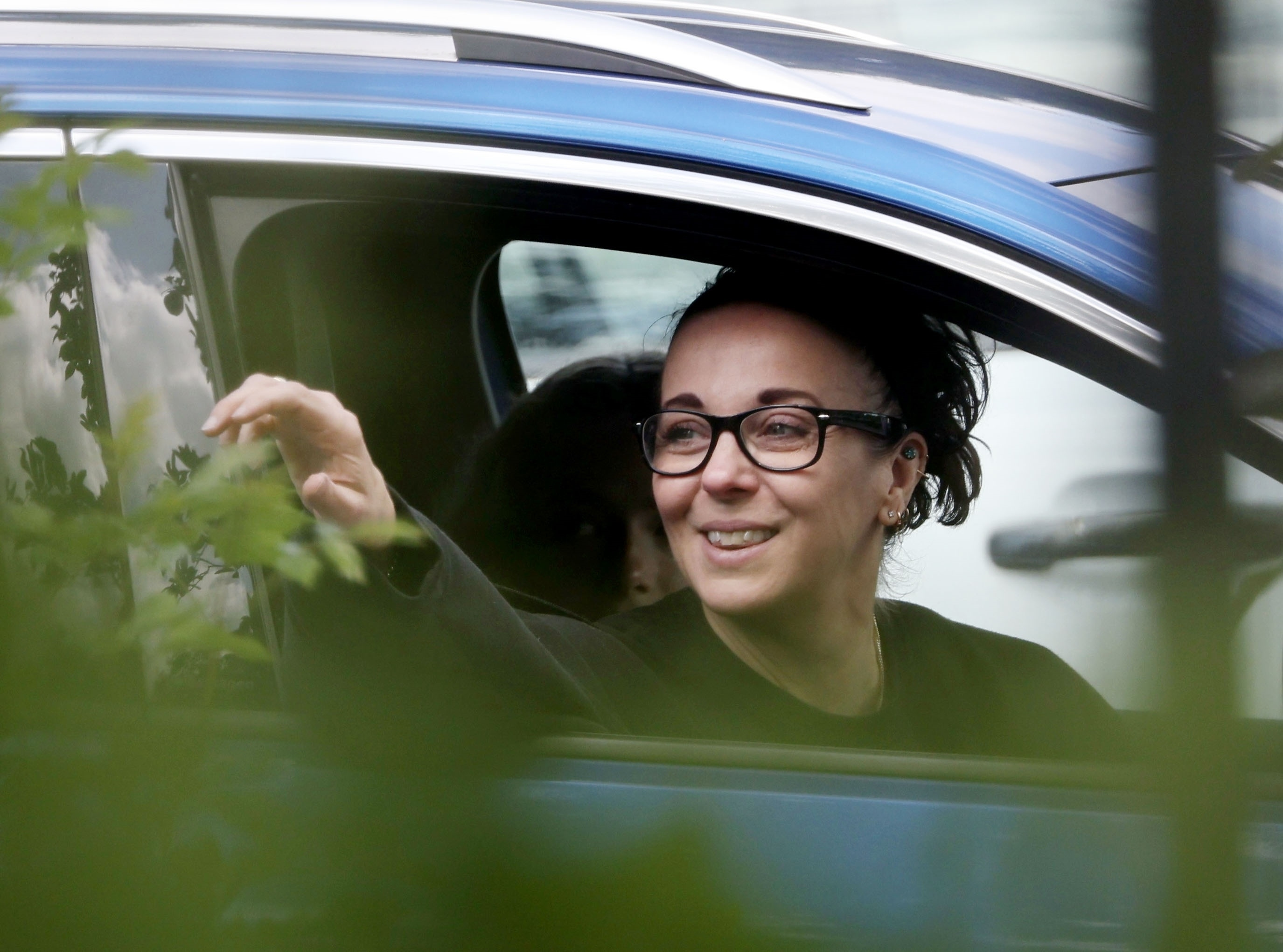 Amanda Abbington laughed and joked with staff at a Starbucks drive-through on the outskirts of London