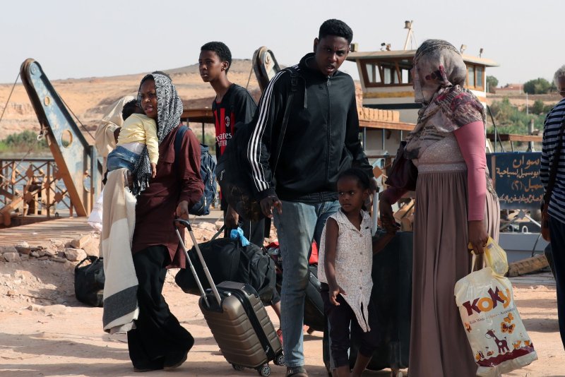 Sudanese cross the border from Sudan to Egypt on May 18, 2023. The United Nations refugee agency UNCHR said Wednesday that a new report shows 2.9 million displaced people worldwide will need resettlement in 2025 including 242,000 from South Sudan. File Photo by Khaled Elfiqi/EPA-EFE