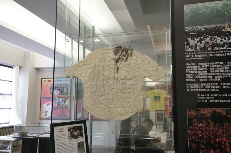 The bloodied blouse of a reporter covering the crackdown. It's displayed behind glass.