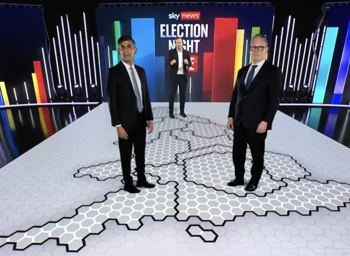 Life-sized virtual projections of the two main leaders pop up from the 'dance-floor'