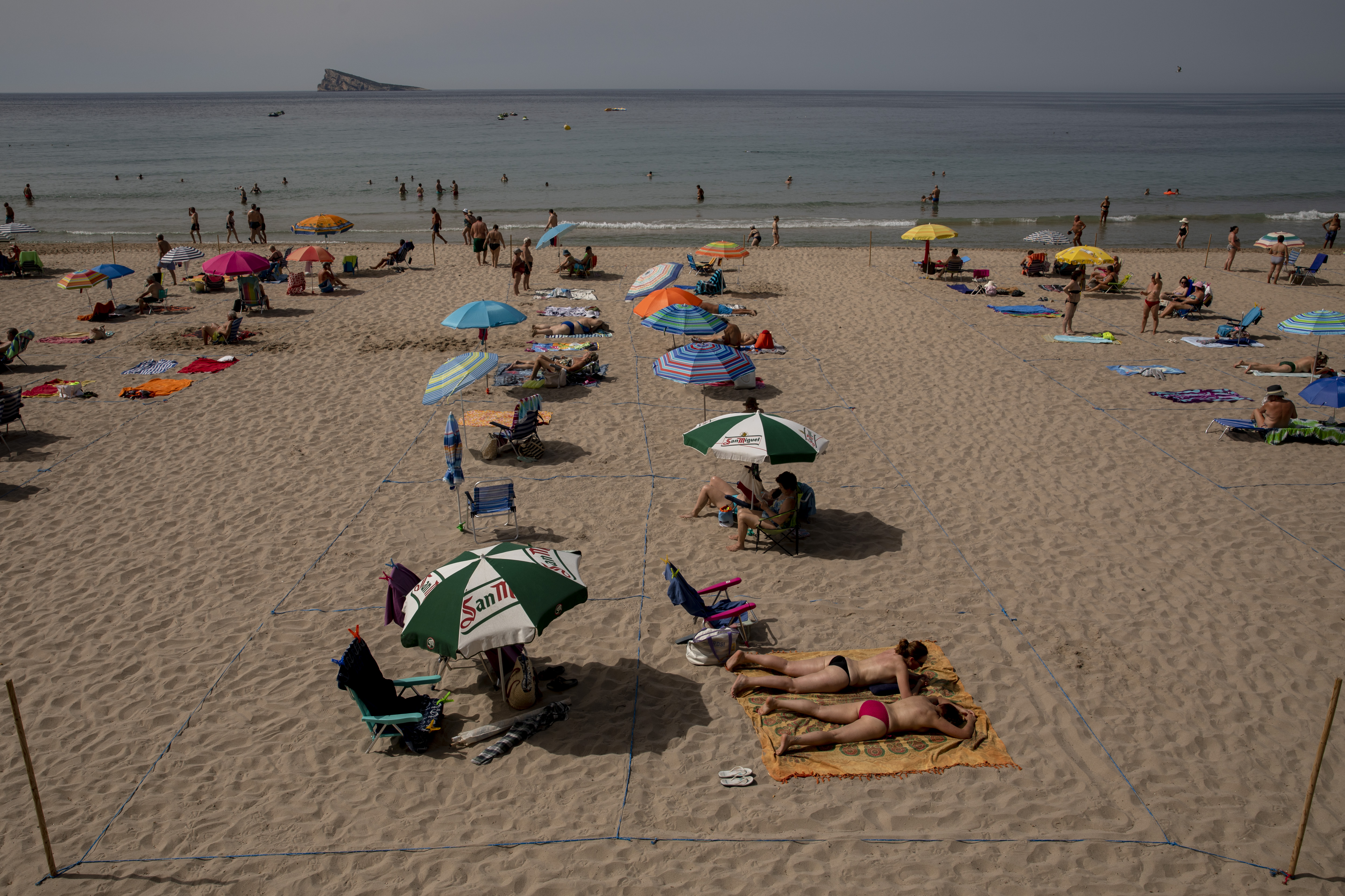 The police in Benidorm have warned holidaymakers to respect the thin blue lines found on the sand
