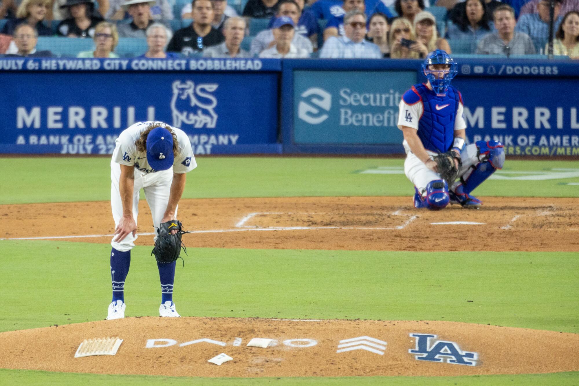 Dodgers pitcher Tyler Glasnow reacts after giving up a grand slam to Milwaukee's Rhys Hoskins.