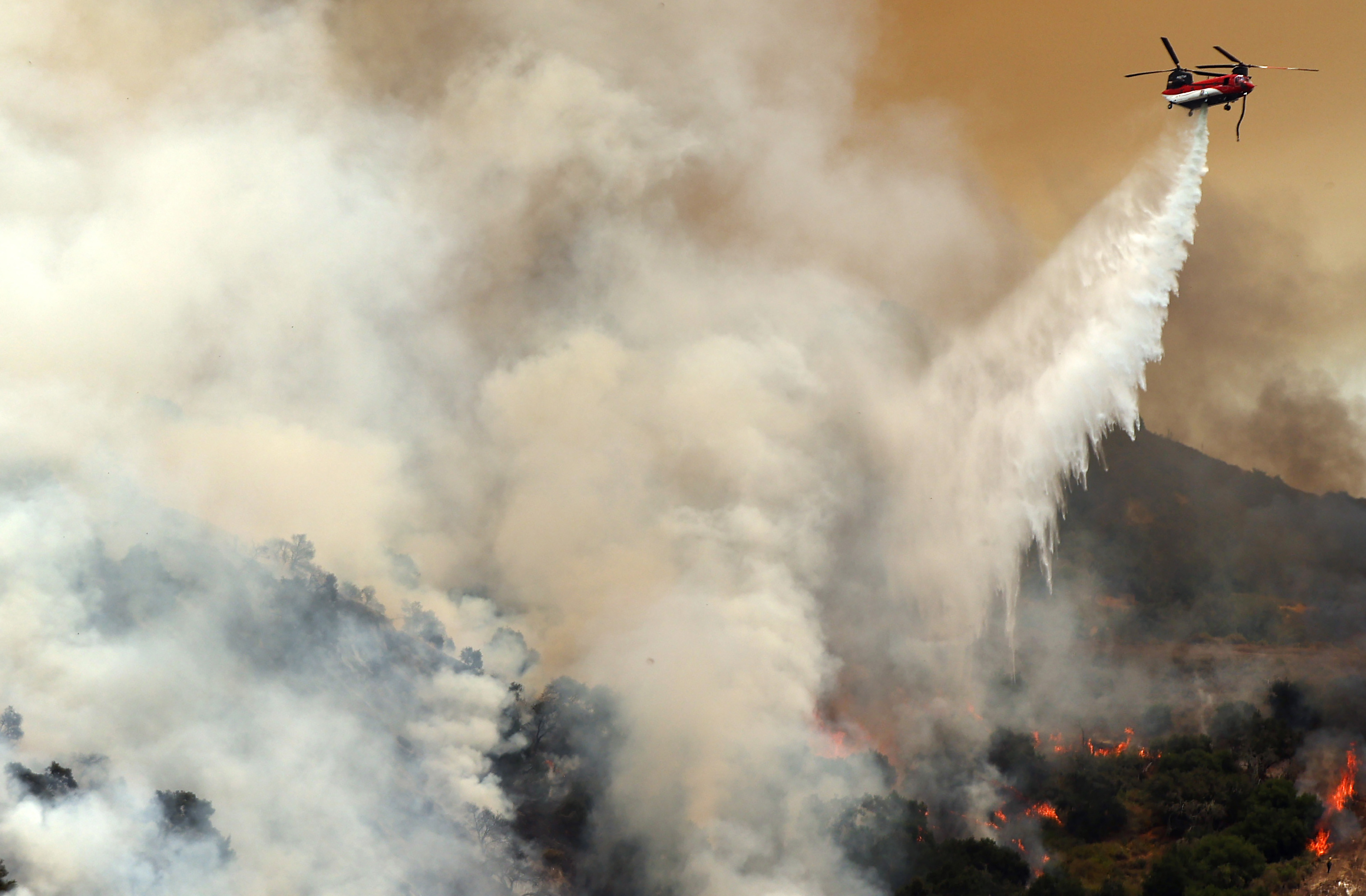 Firefighters are racing to put out Lake Fire