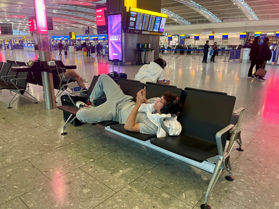 Passengers settling down for the night in Terminal 5