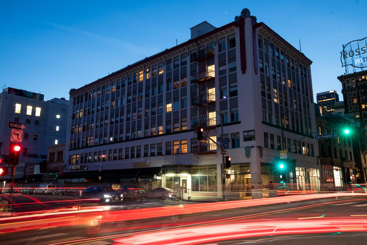 Traffic moves past the Baltimore Hotel in Los Angeles' Skid Row neighborhood.