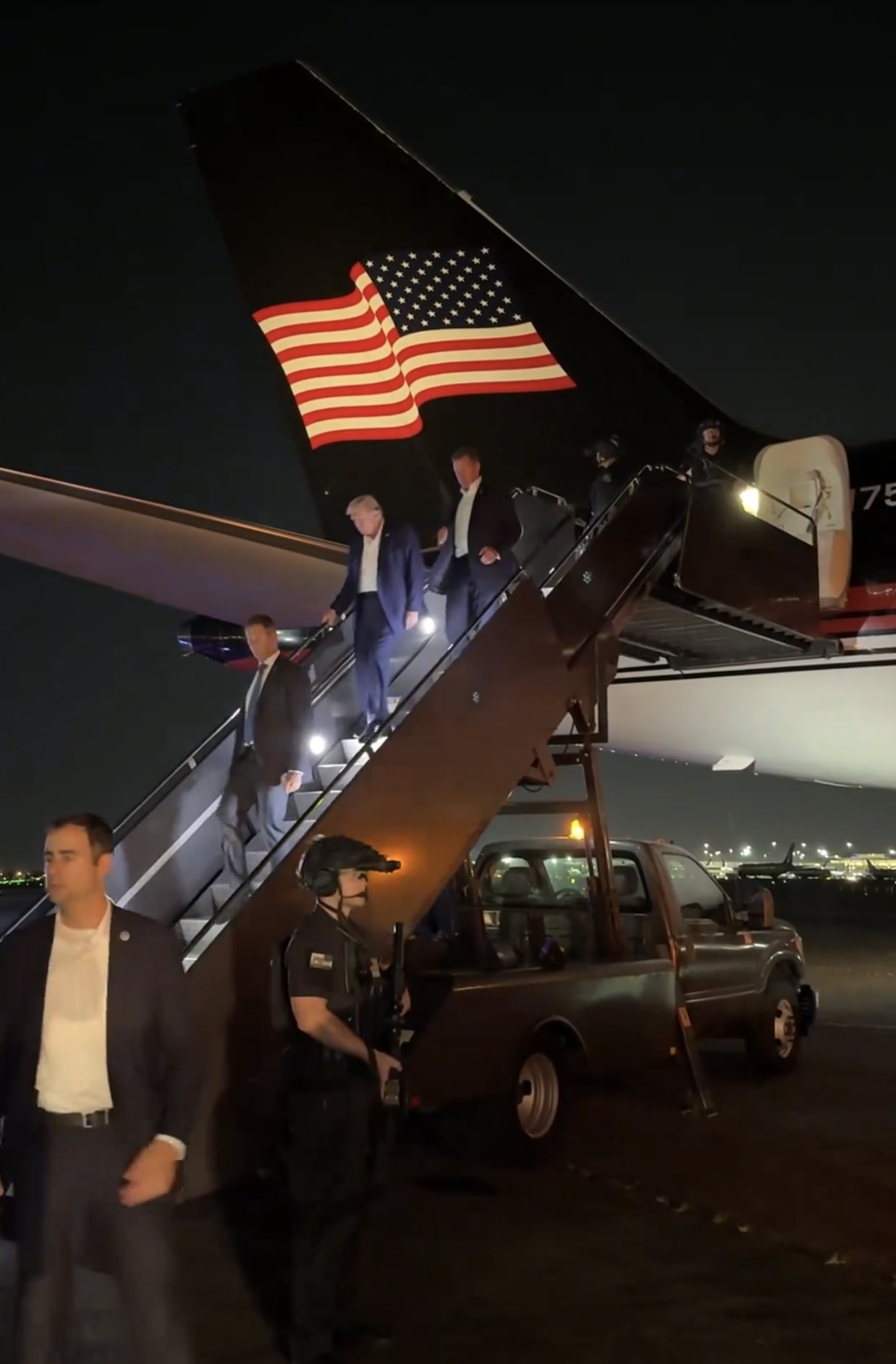 Donald Trump was pictured getting off his plane early Sunday at Newark Airport hours after being treated for the shooting