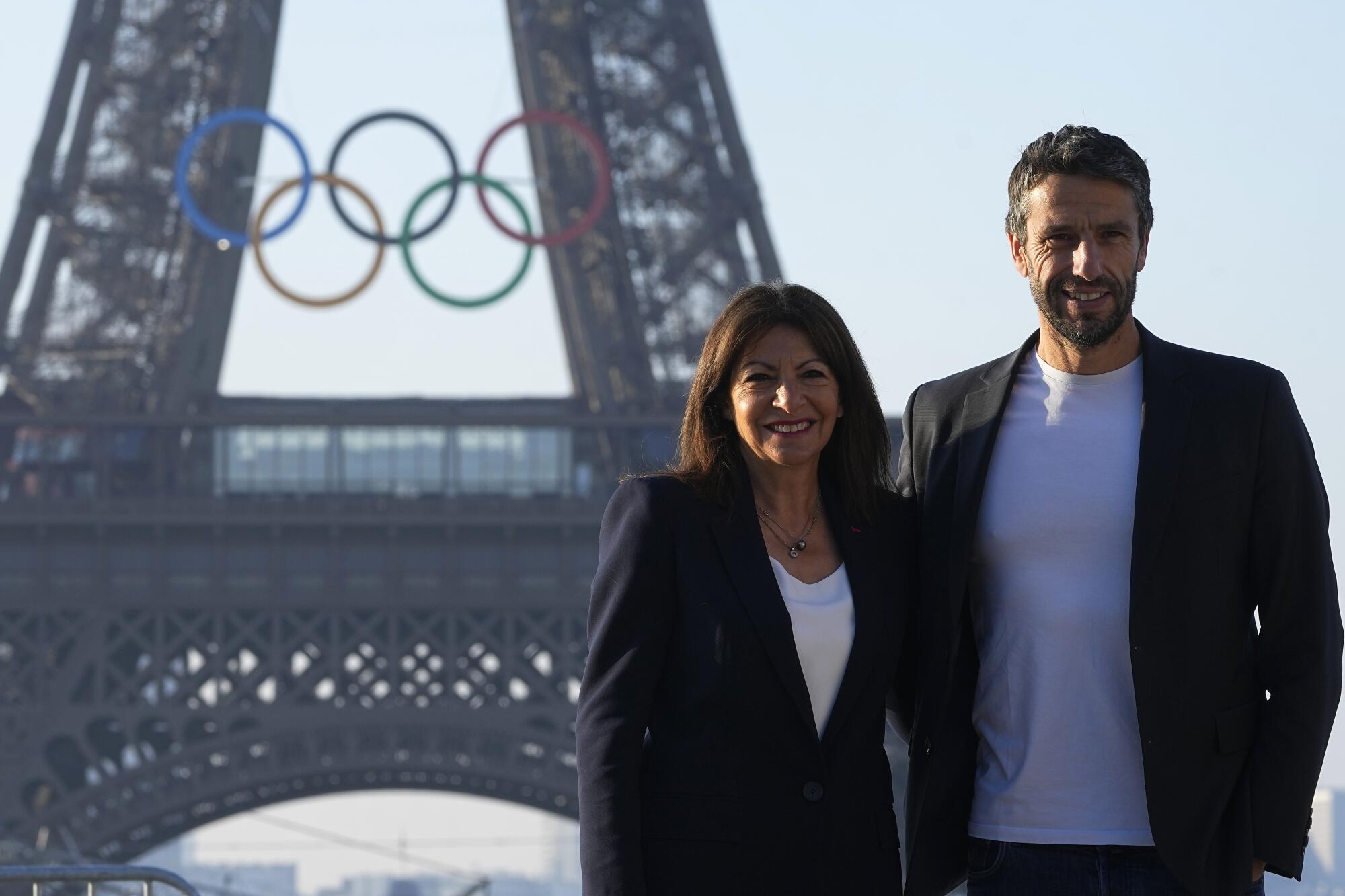 Paris mayor Anne Hidalgo and Tony Estanguet, the head of the Paris Olympic committee, in front of the Eiffel Tower.