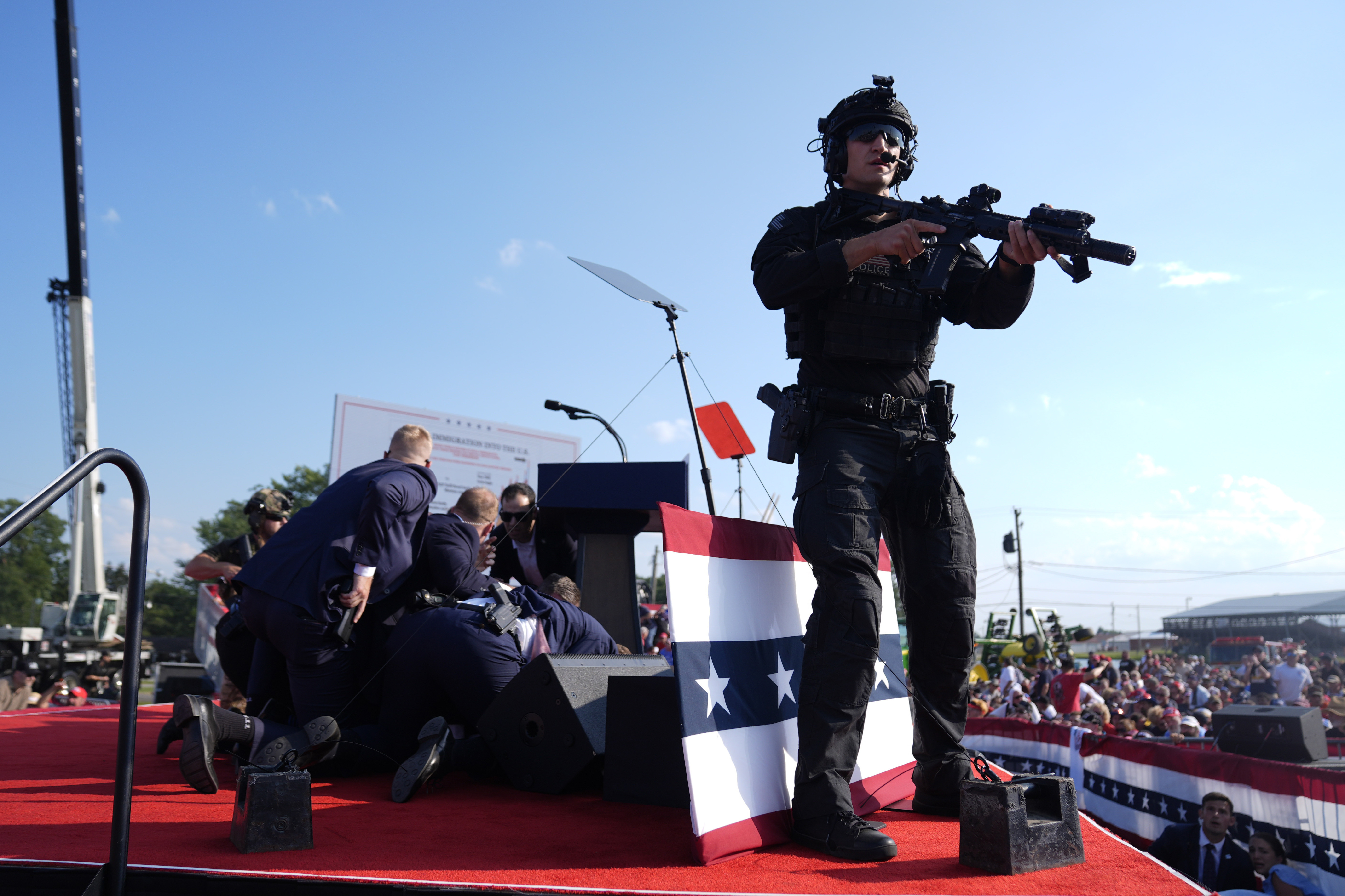 As the sound of shots rang out, the Secret Service piled on top of the former president