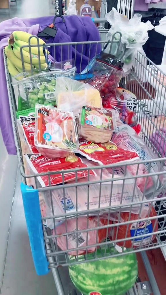 Alicia Dougherty needed four trolleys to stock up her fridge and cupboards