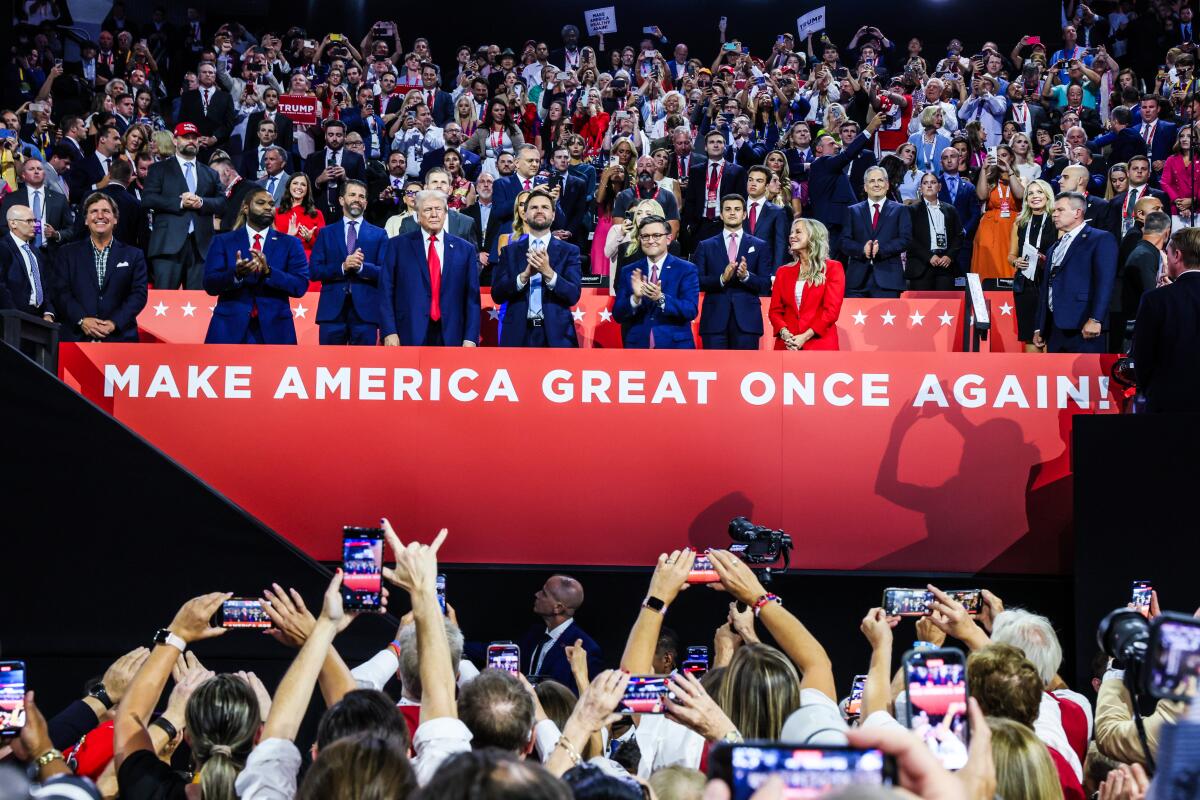 The RNC crowd cheers former President Trump on Monday night.