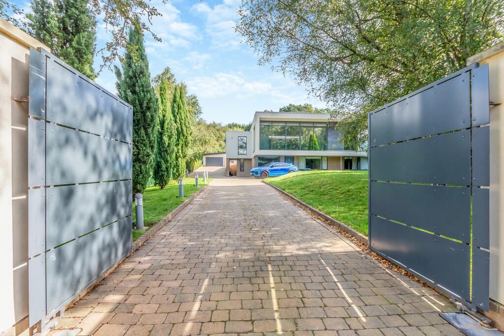 The house is protected by electronic gates