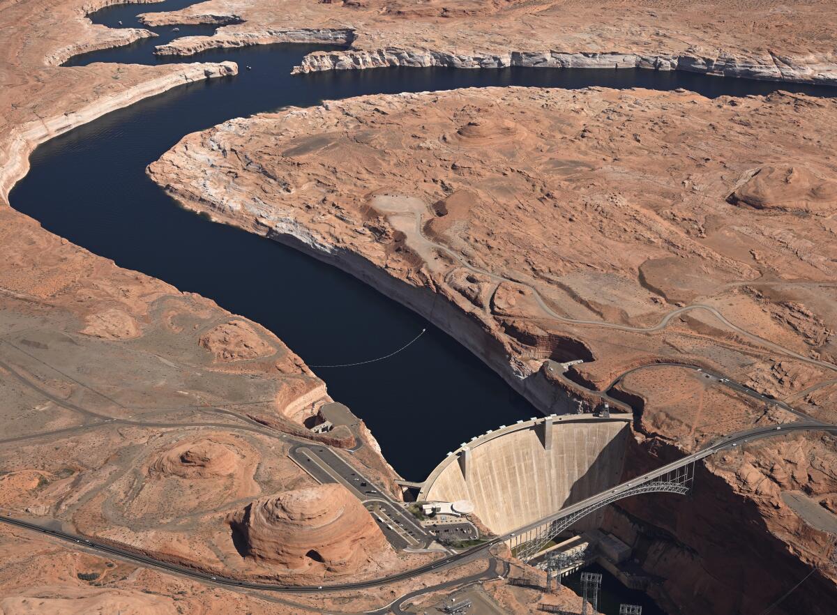 Glen Canyon Dam holds back the Colorado River water to create Lake Powell.