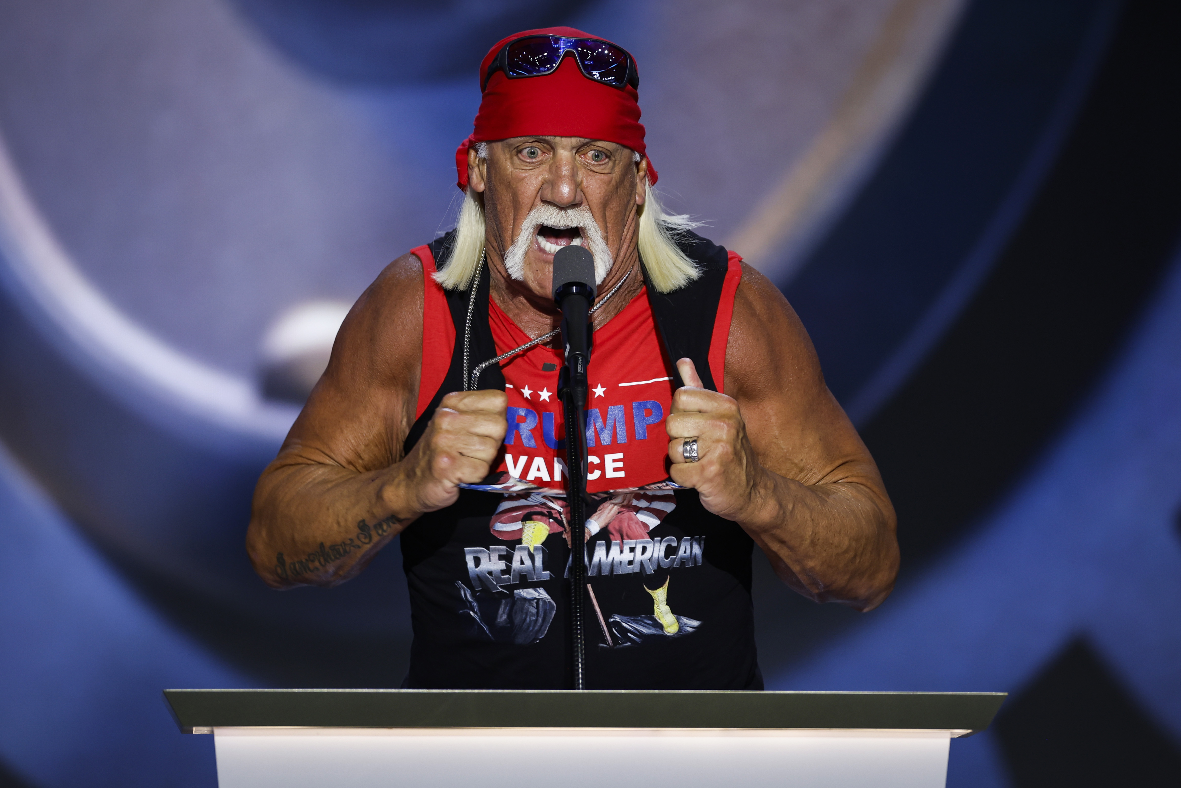 Professional entertainer and wrestler Hulk Hogan rips his shirt as he speaks on stage on the fourth day of the Republican National Convention