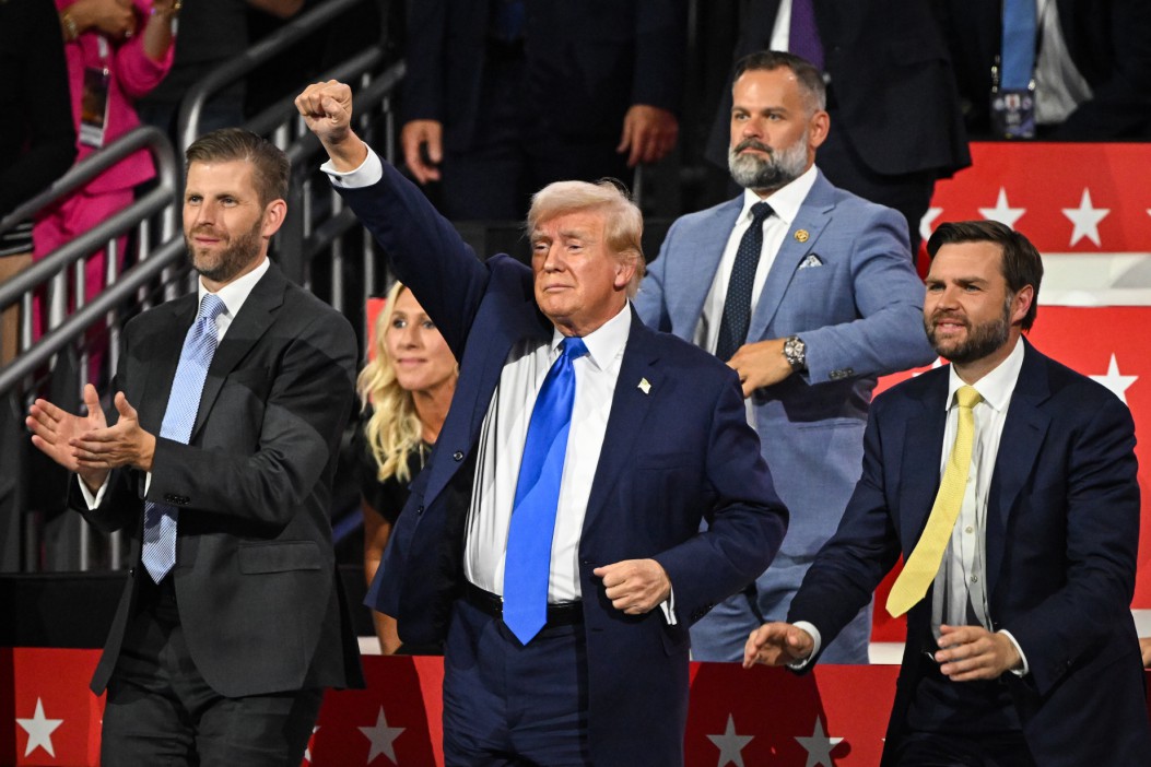 Trump threw a fist in the air to rally the crowd at the RNC