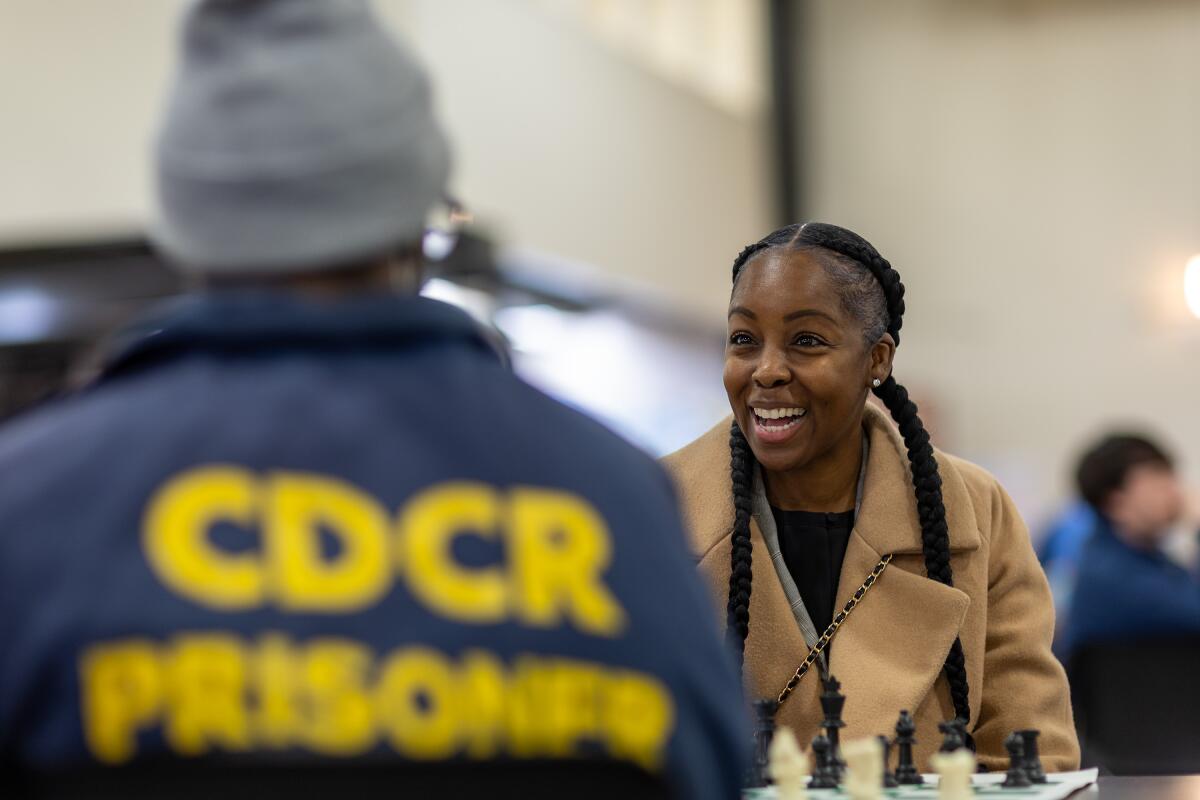 Prisoners compete against correctional officers inside a gym at San Quentin.