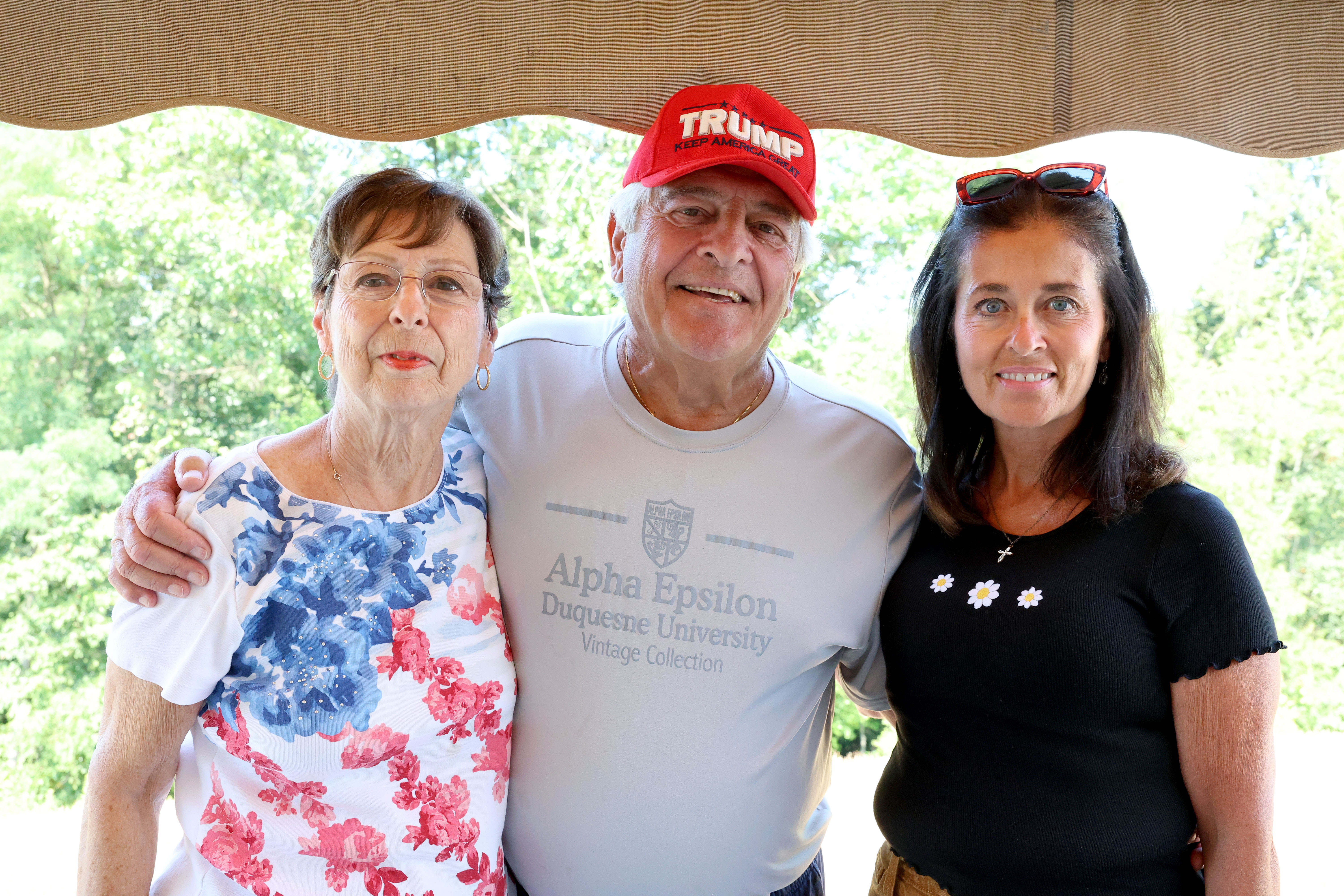 Mike Costanzo, 77, a stockbroker Rosemary Costanzo, 77, and Jodine Downey, former television anchor pictured were in the front row behind Donald Trump at the Pennsylvania rally where the assassination attempt happened