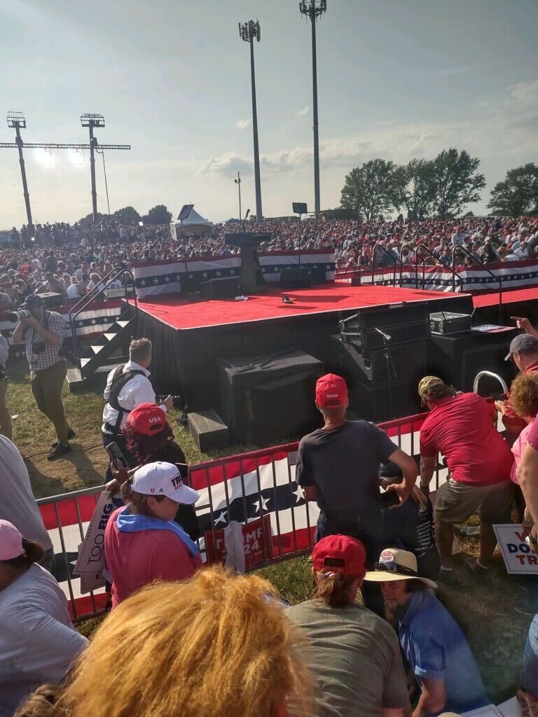 One of Donald Trump’s shoes is seen left on the podium after he was shot at the rally in Butler, Pennsylvania by Thomas Matthew Crooks