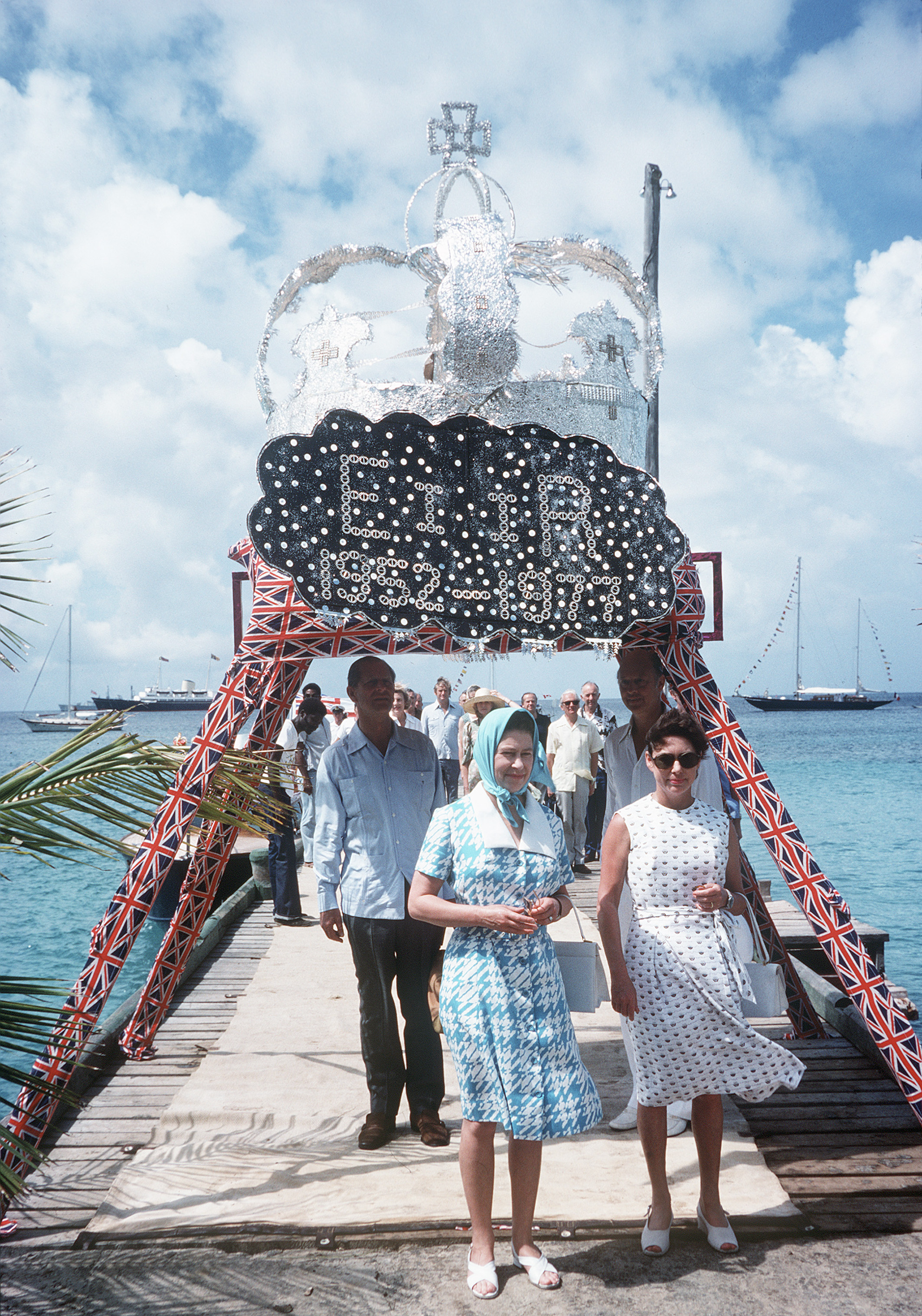 The late Queen Elizabeth II pictured in Mustique with Princess Margaret in 1977