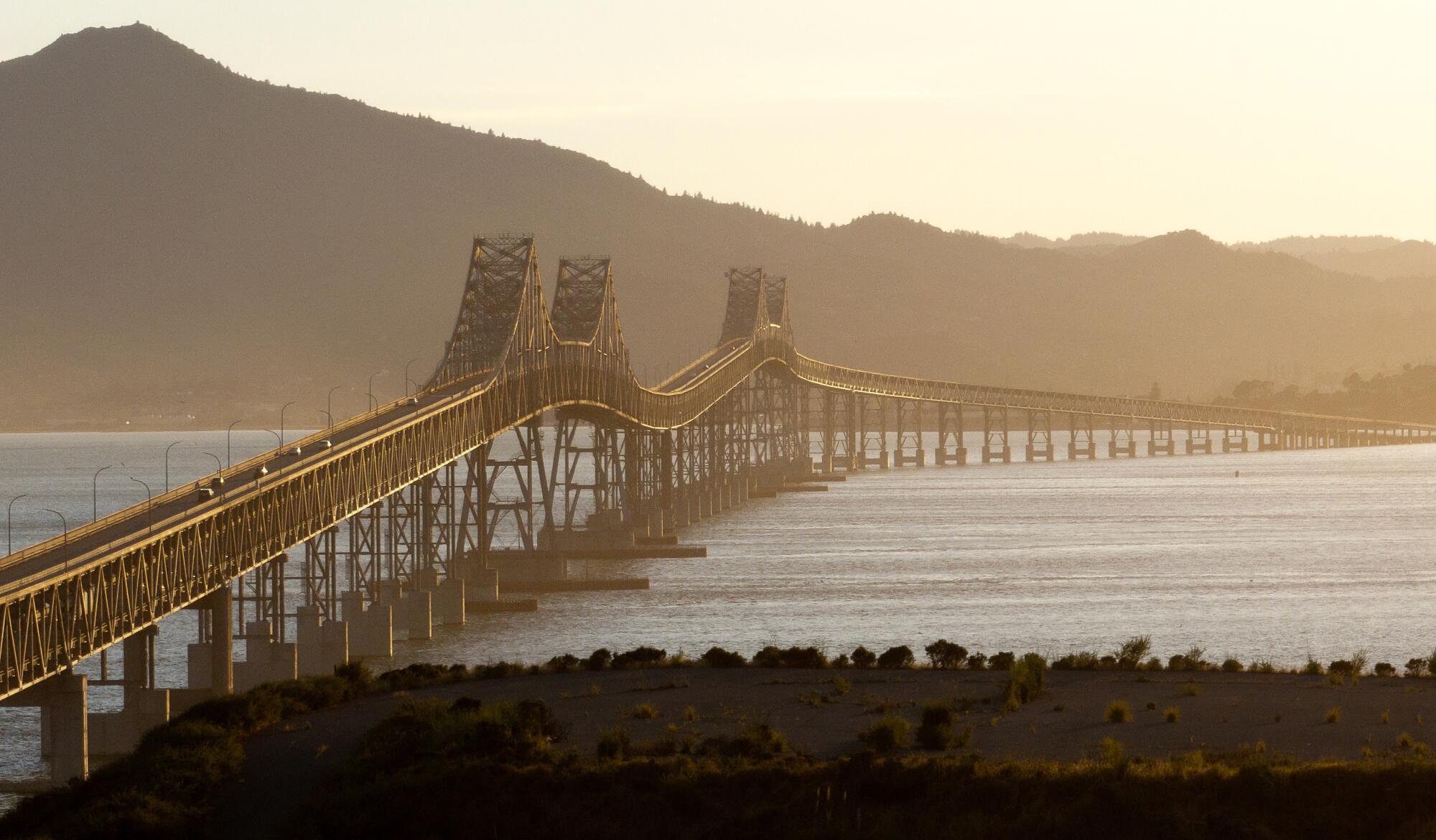 A bridge spans a bay.