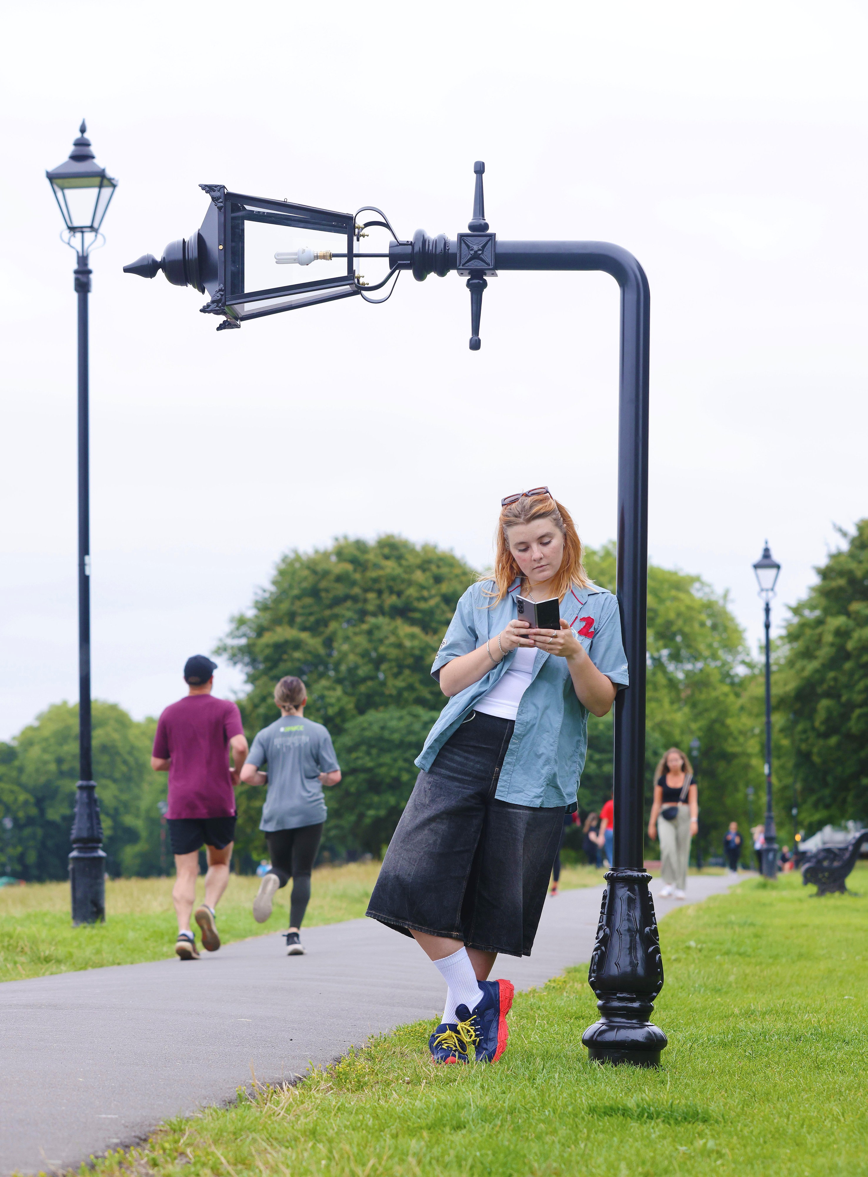 A folded bench and lamppost created by Jem Hughes appears in Clapham Common