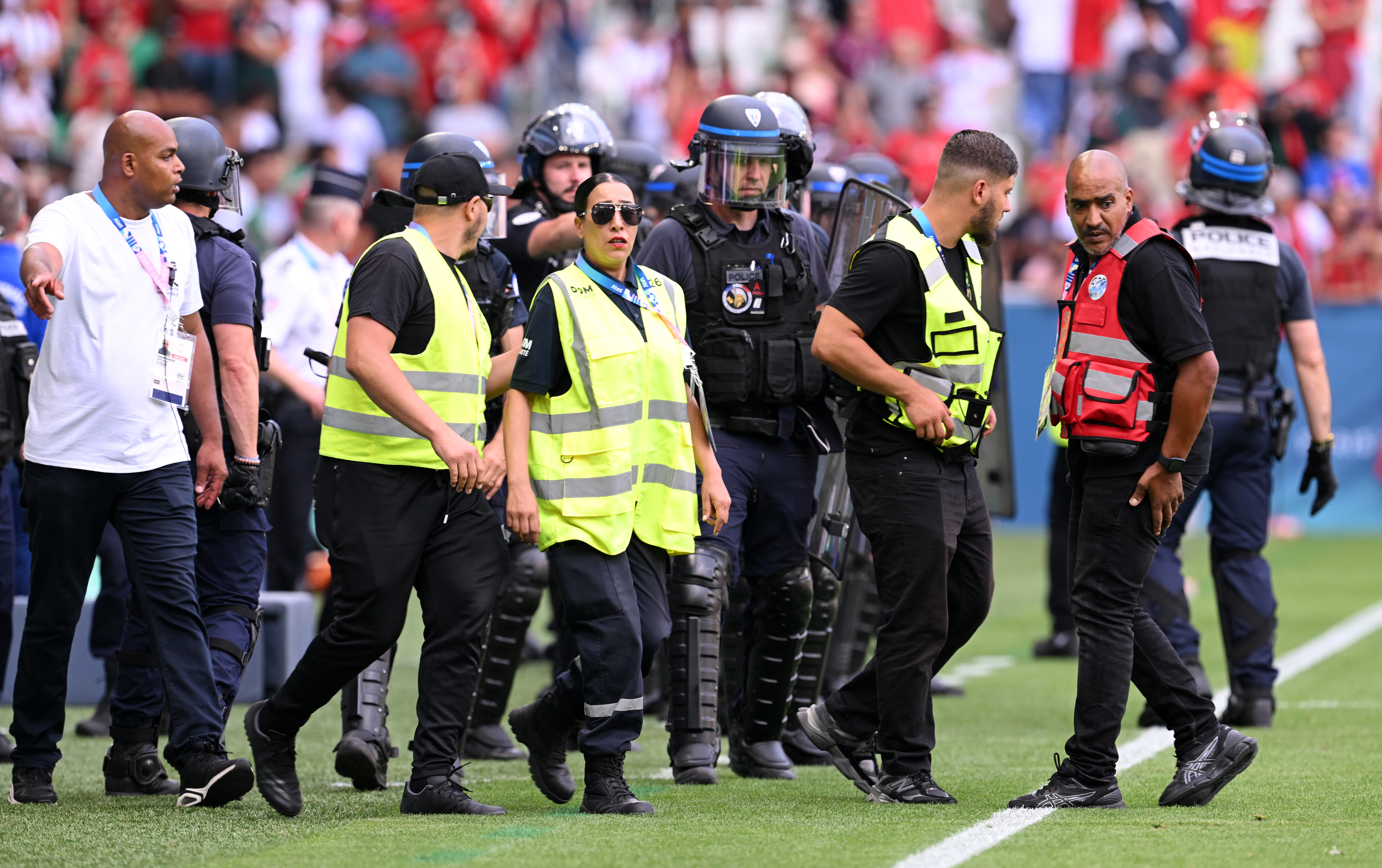 Armed police were on hand to take over matters once fans invaded the pitch