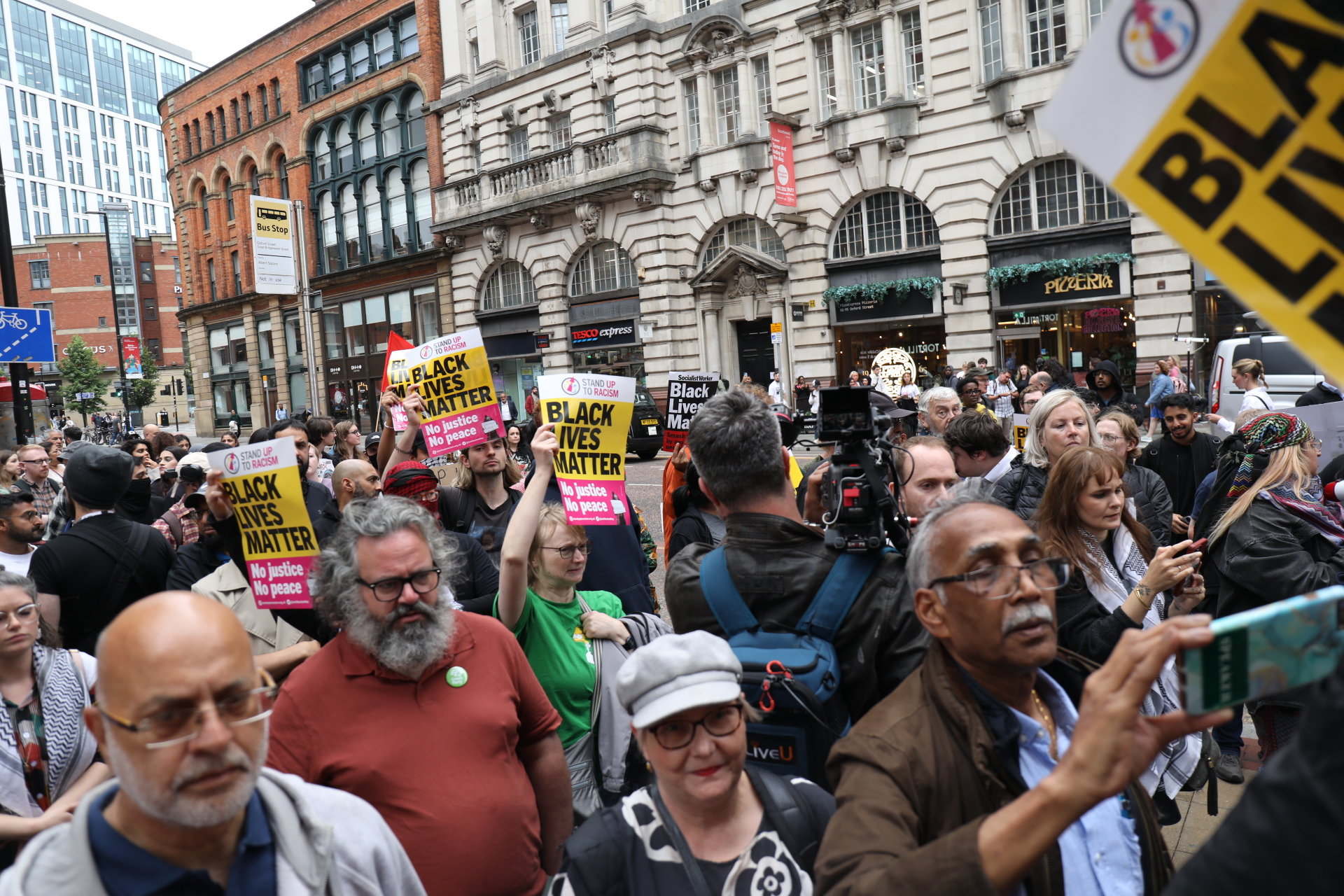 Protesters staged a demonstration outside the office of Mayor of Greater Manchester, Andy Burnam in Manchester this evening