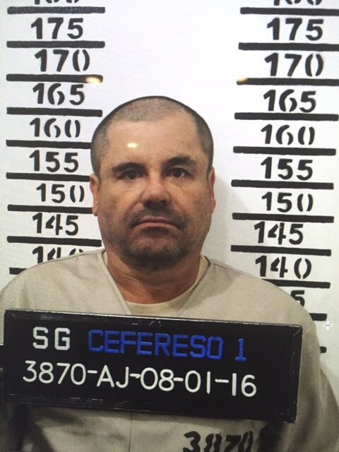 El Chapo stands for his prison mug shot in Mexico before being extradited to the United States