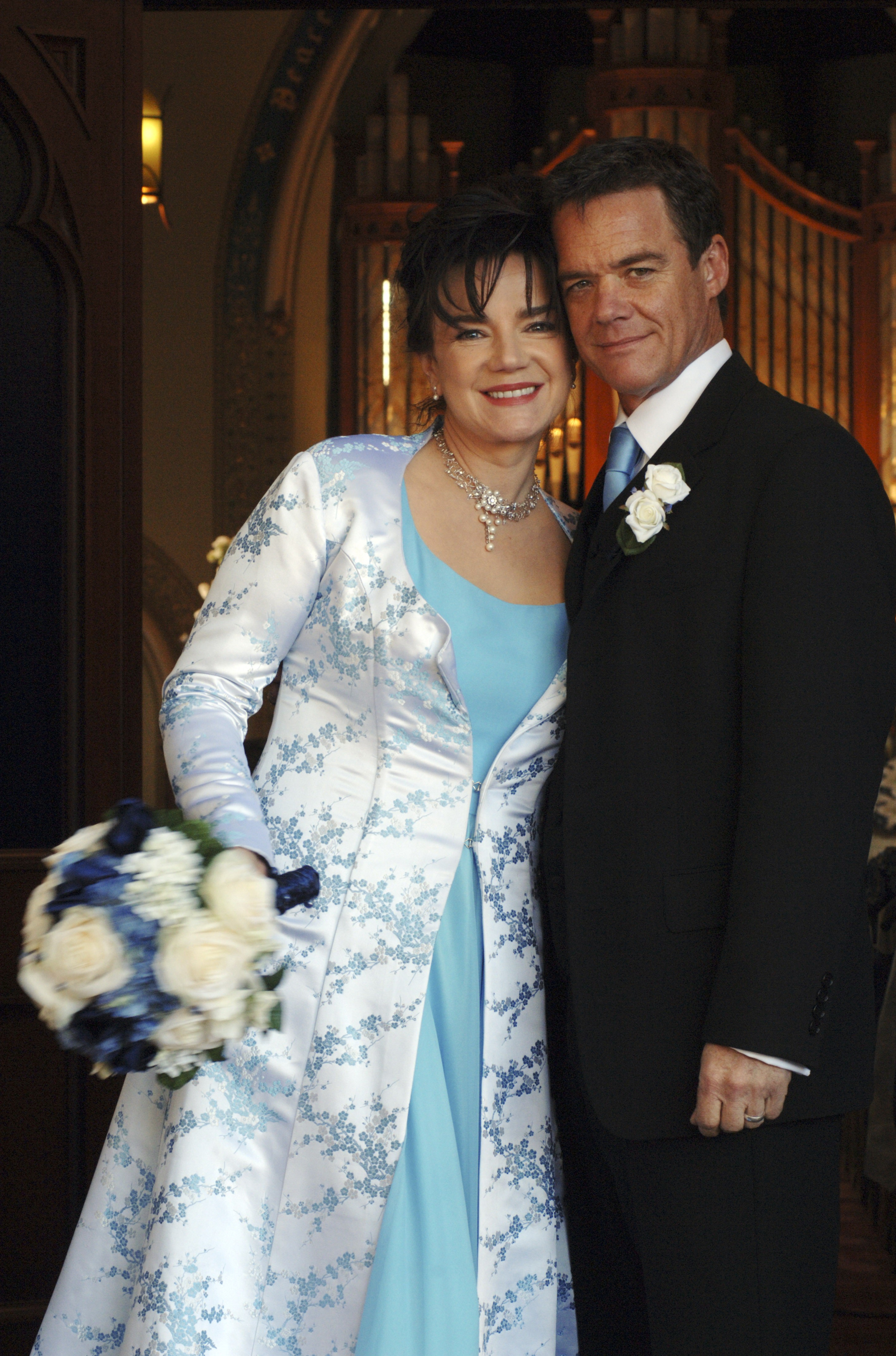 Neighbours legend Janet Andrewartha, pictured with Stefan Dennis, died on Friday