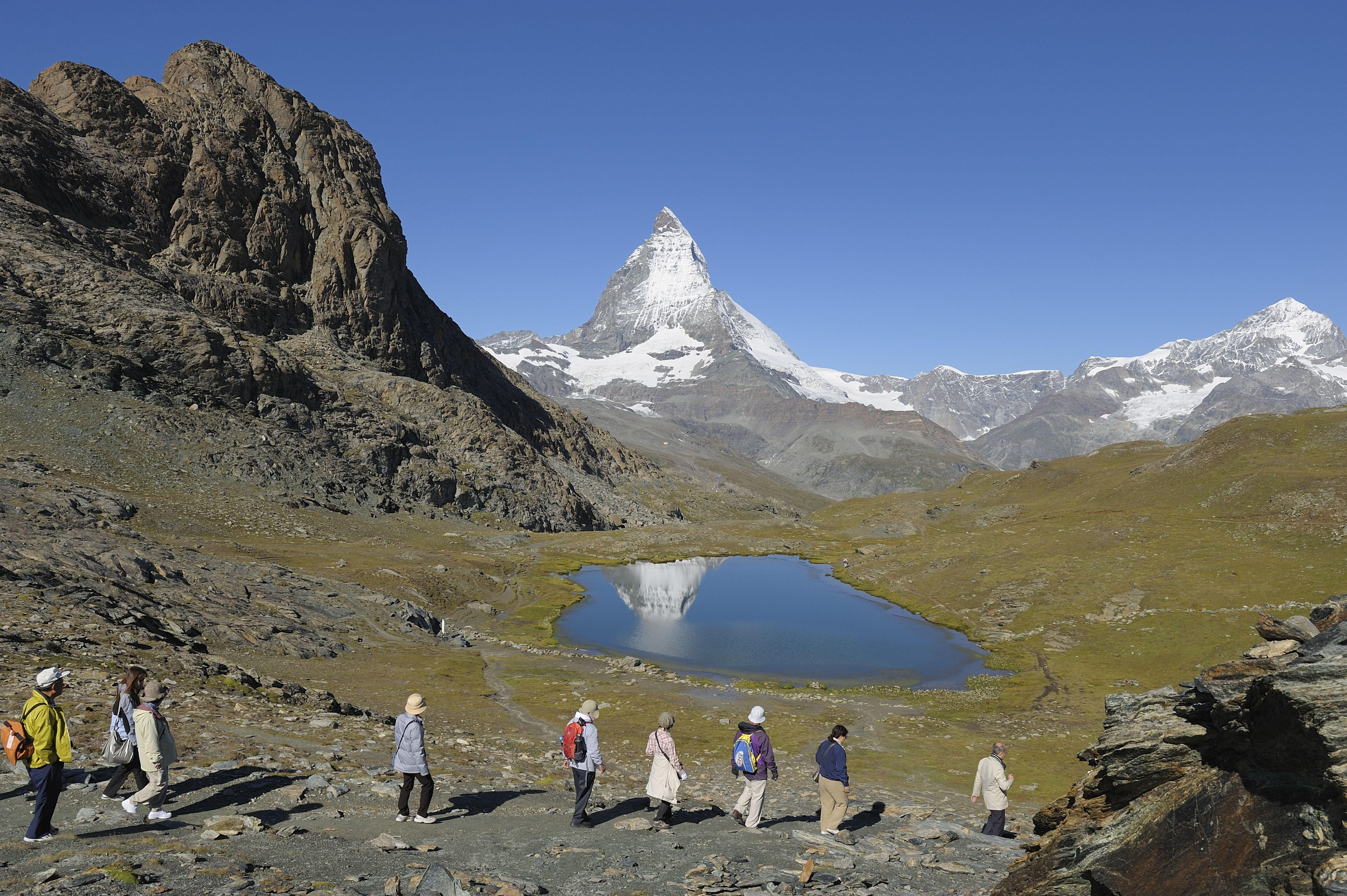 Thousands of tourists flock there each day to capture the picture-perfect scenery