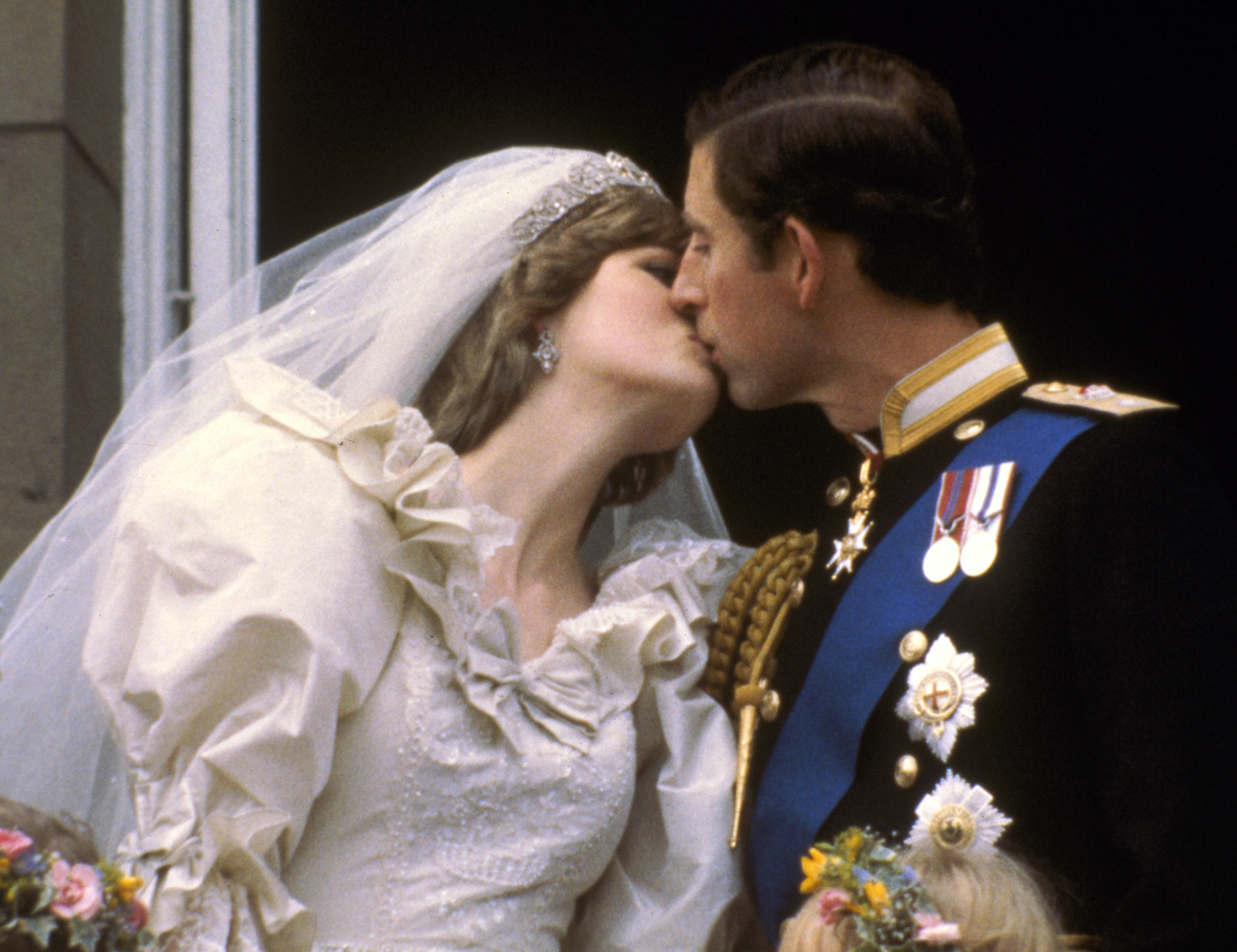 Diana leaned towards Charles for their kiss showing 'trust'