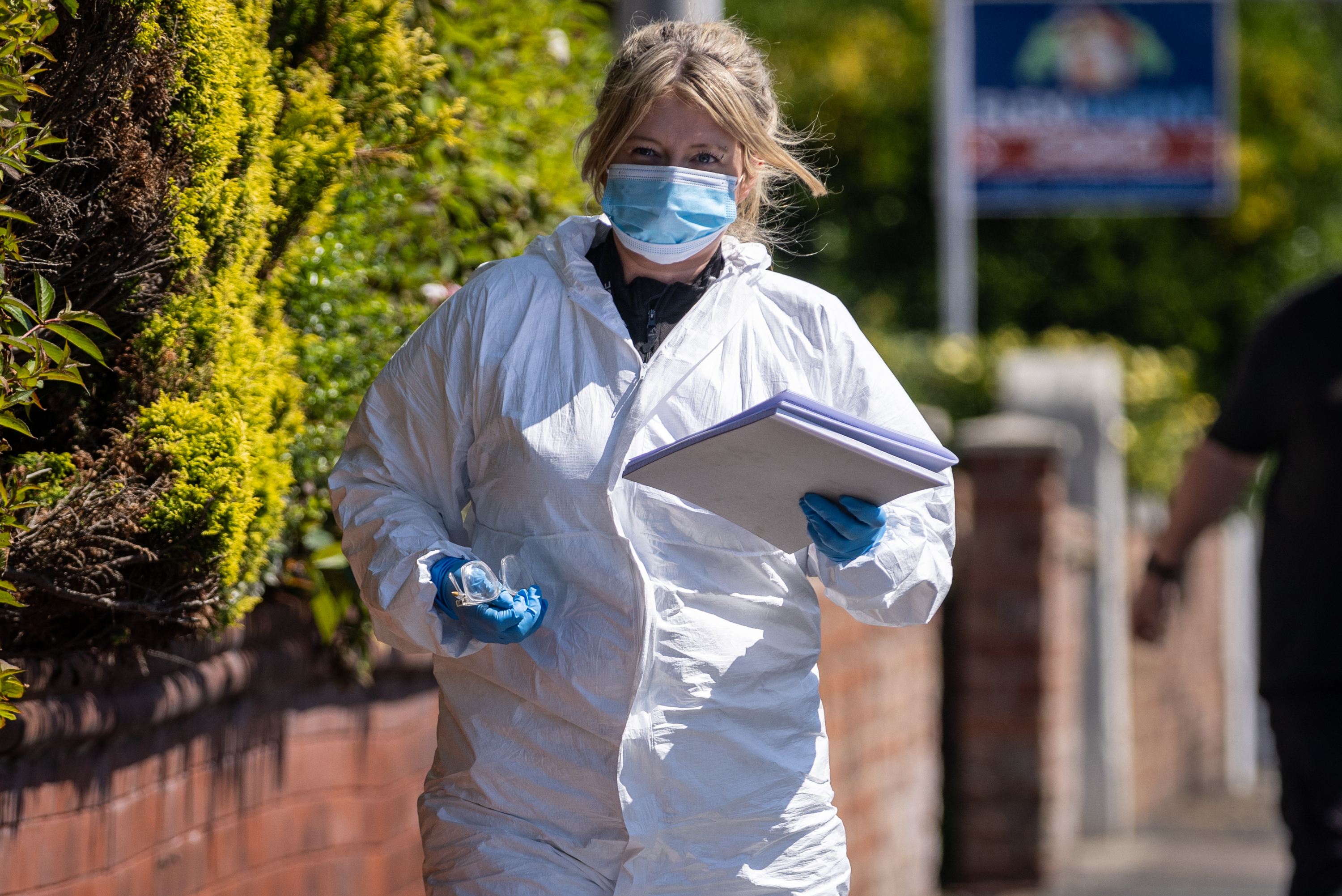 A police scenes of crime officer works at the scene