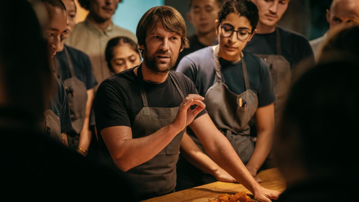 Chef René Redzepi speaks to employees at his Copenhagen restaurant Noma in a scene from the documentary series "Omnivore."