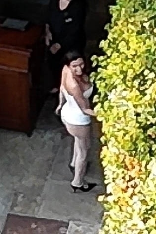 Bianca Censori was seen wearing a white strapless bodysuit with semi-sheer white tights and black high heels