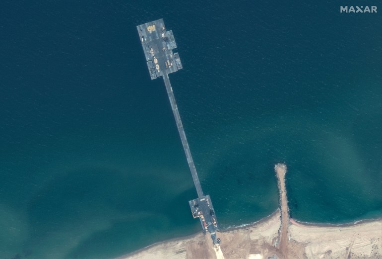 A satellite image shows an overview of trident pier, amid the ongoing conflict between Israel and the Palestinian Islamist group Hamas, on the Gaza shoreline, May 18, 2024. Maxar Technologies/Handout via REUTERS THIS IMAGE HAS BEEN SUPPLIED BY A THIRD PARTY NO RESALES. NO ARCHIVES. MANDATORY CREDIT. MUST NOT OBSCURE LOGO